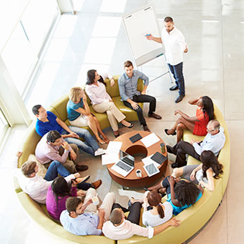 Human resources managers participating in a a discussion at a conference